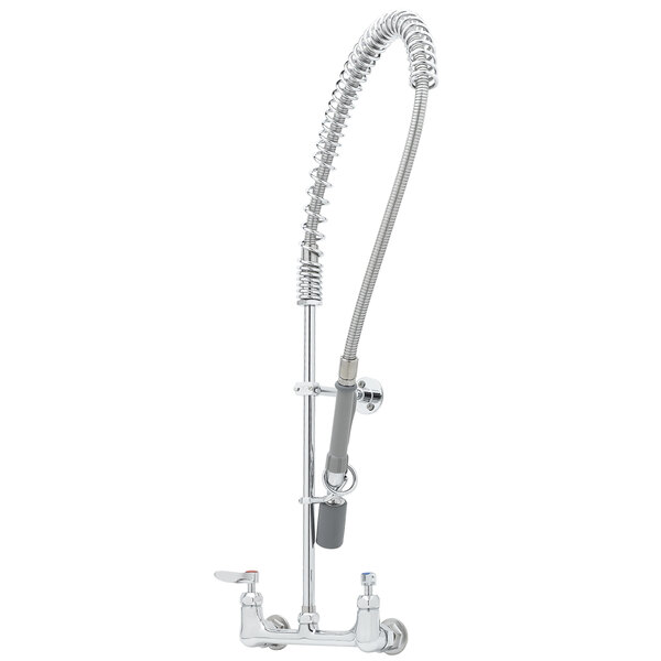 A chrome T&S pre-rinse faucet with a hose attached.