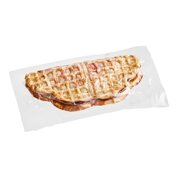 A Nordic Waffles Berries and Cream waffle sandwich wrapped in plastic.