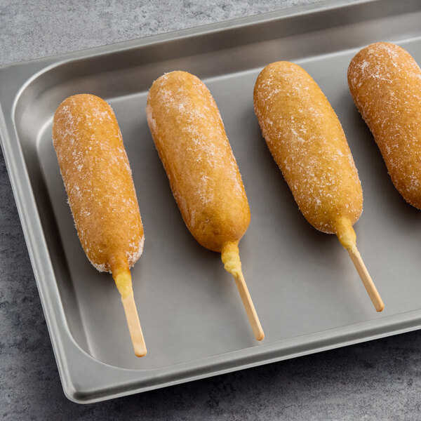 Foster Farms Honey Chicken Corn Dogs on a tray.