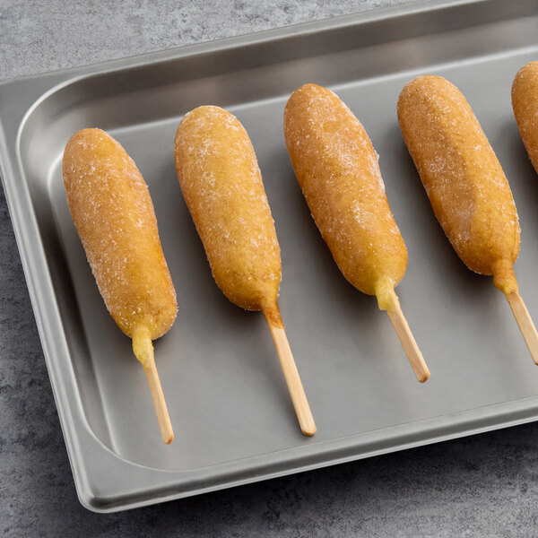 A tray of 6 Foster Farms Chicken Corn Dogs.