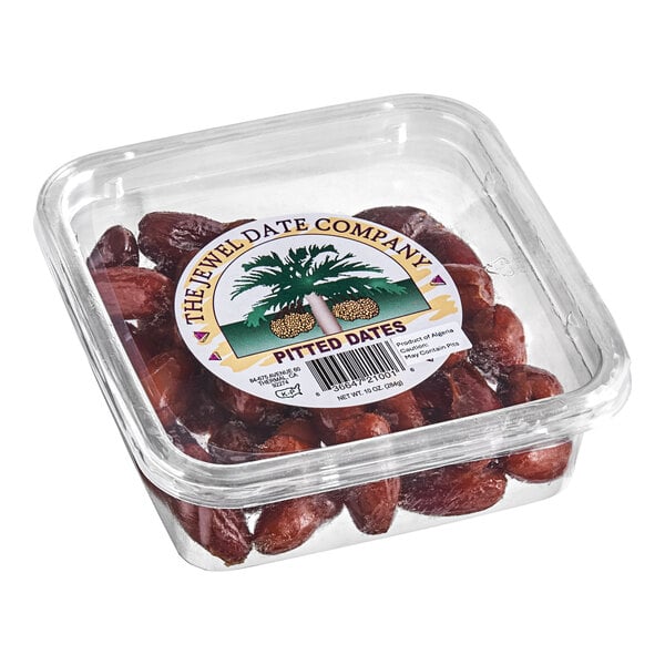 A plastic container of Dried Pitted Deglet Noor Dates with a label.