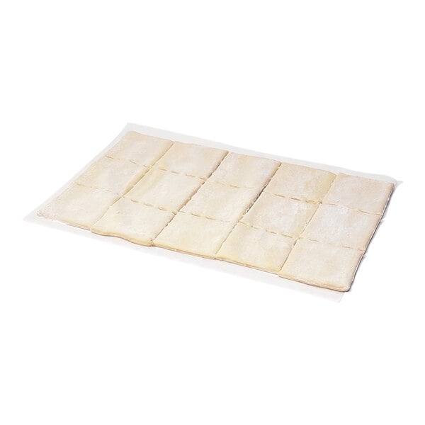 A close up of Bridgford Sopapilla Dough squares.