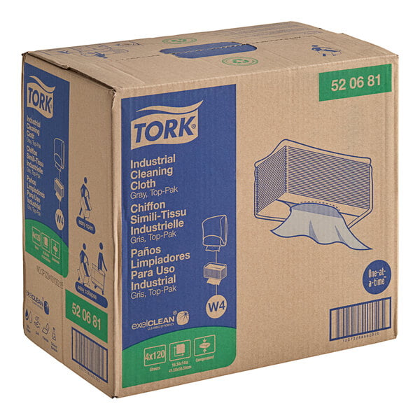 A box of Tork heavy-duty industrial cleaning cloths with blue and white labels.