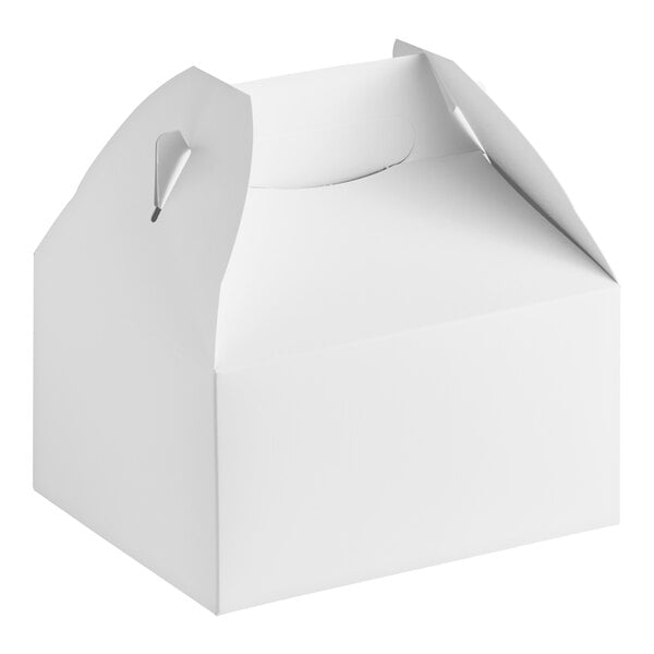 A white barn box with a handle.