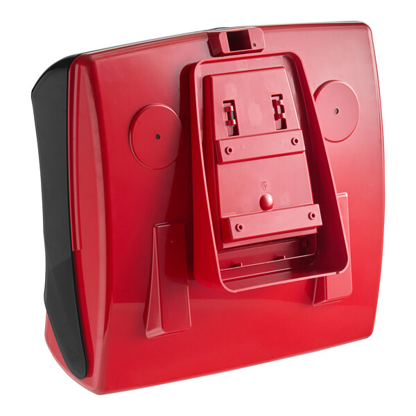 A red and black rectangular Tork folded wiper dispenser with two black handles.