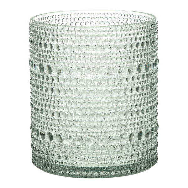 A sage plastic Fortessa double old fashioned glass with a patterned design.