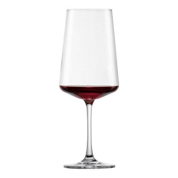 A Fortessa Miovino Tritan Crystal red wine glass filled with red wine.