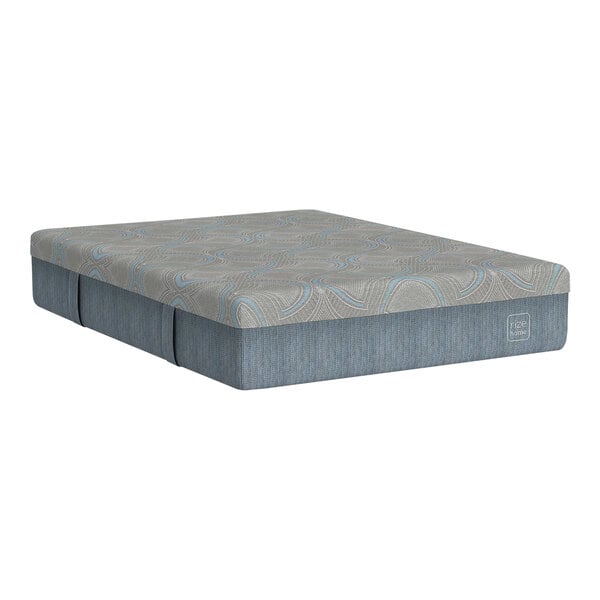 A Rize Home Cool Flex Pro king size hybrid mattress with a blue and white pattern.