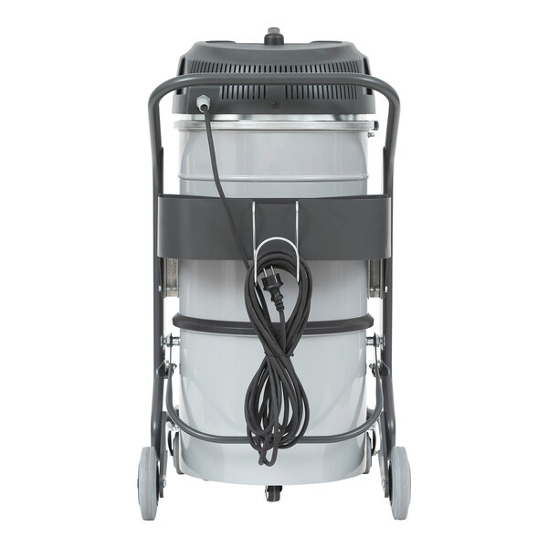 A Nilfisk industrial wet/dry vacuum on a cart with a cord.