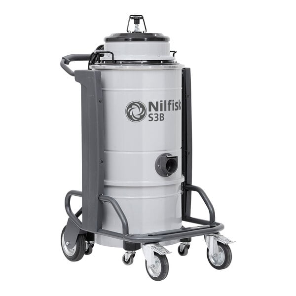 A grey and black industrial wet/dry vacuum with black wheels.