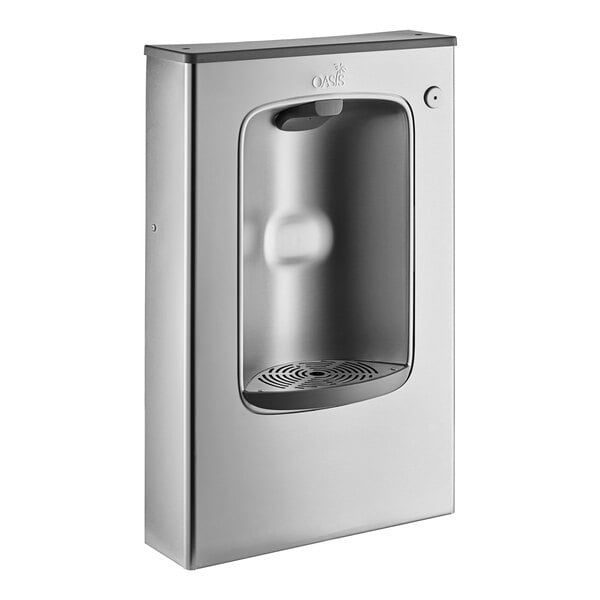 A stainless steel rectangular water bottle filling station with a hole.