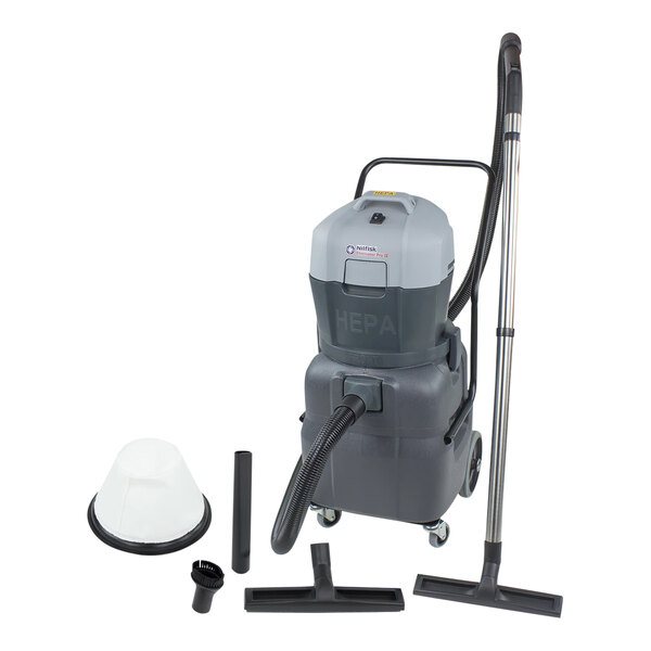 A Nilfisk wet/dry vacuum with a hose and a handle attached to a bucket.