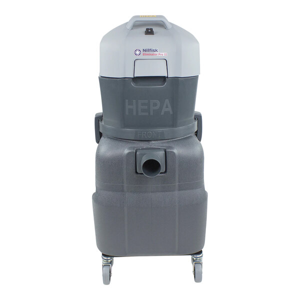 A grey Nilfisk Eliminator Pro II wet / dry vacuum cleaner with wheels.
