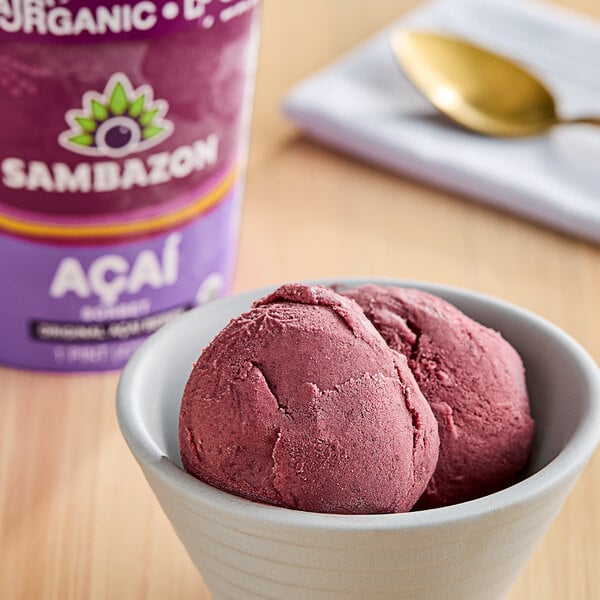 A bowl of Sambazon Organic Acai Sorbet with a spoon.