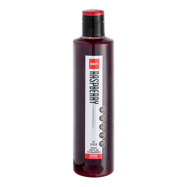 A close up of a bottle of SHOTT Raspberry flavoring syrup.