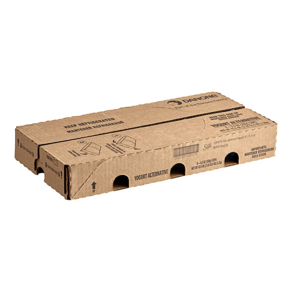 A brown cardboard box with three compartments for Silk Dairy-Free Peach Almond Milk Yogurt Alternative.