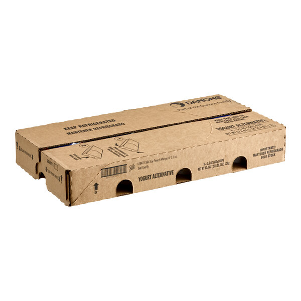 A brown cardboard box with black text for Silk Dairy-Free Peach Mango Soymilk Yogurt Alternative.