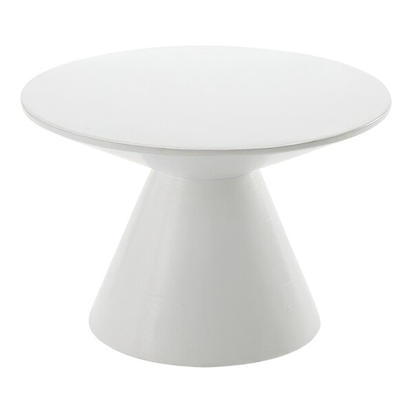 An American Metalcraft Hampton Collection white round mango wood pedestal on a white table.