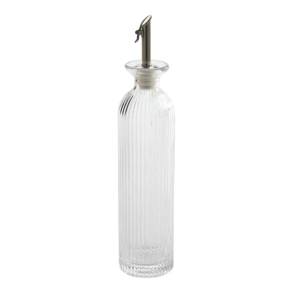 An American Metalcraft fluted clear glass cruet with a metal spout.