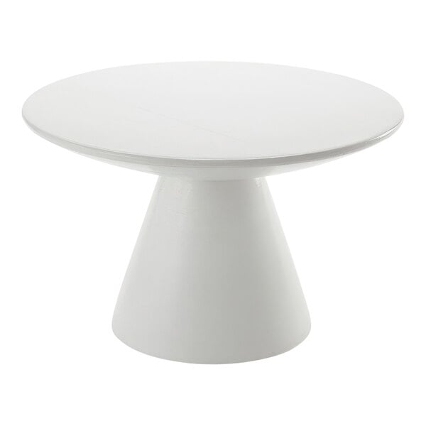 An American Metalcraft white round sun-bleached mango wood pedestal on a white table.