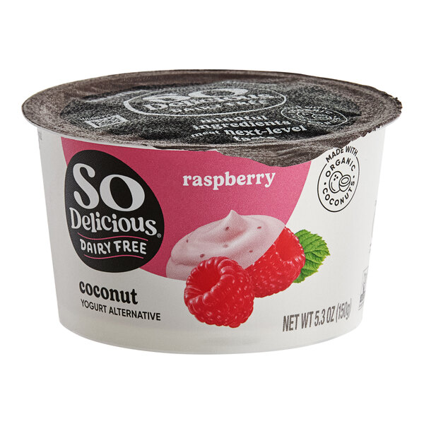 A container of So Delicious raspberry coconut yogurt alternative.