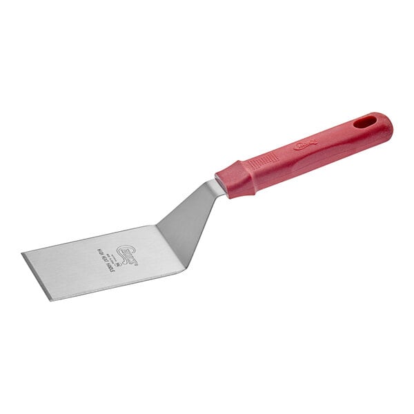 A close-up of a Choice red square edge turner with a nylon handle.
