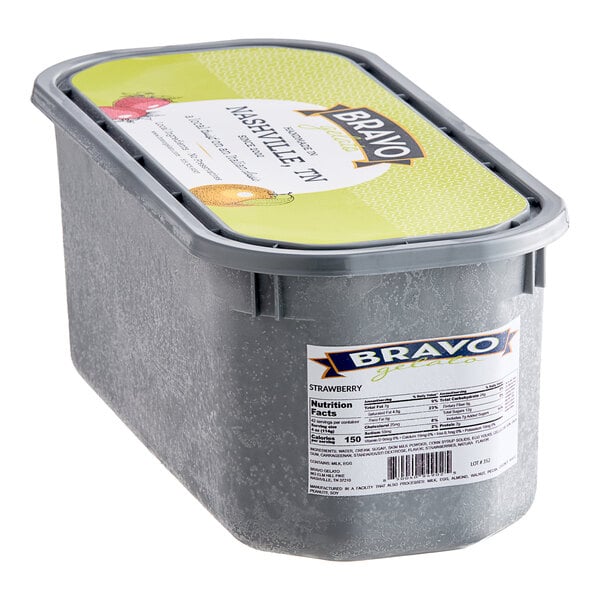 A white Bravo Strawberry Gelato tub with a label.
