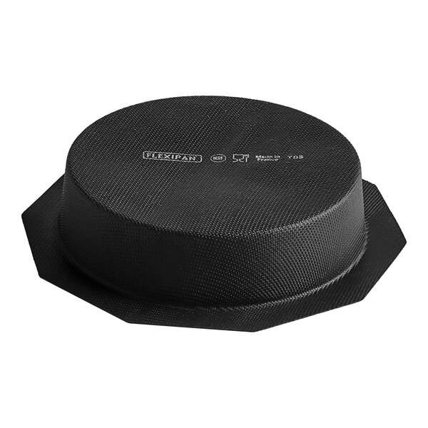 A black round silicone mold with the word "cork" on it.