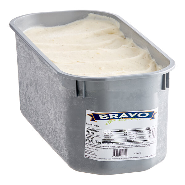 A white Bravo Brown Butter Gelato tub with a lid on it.