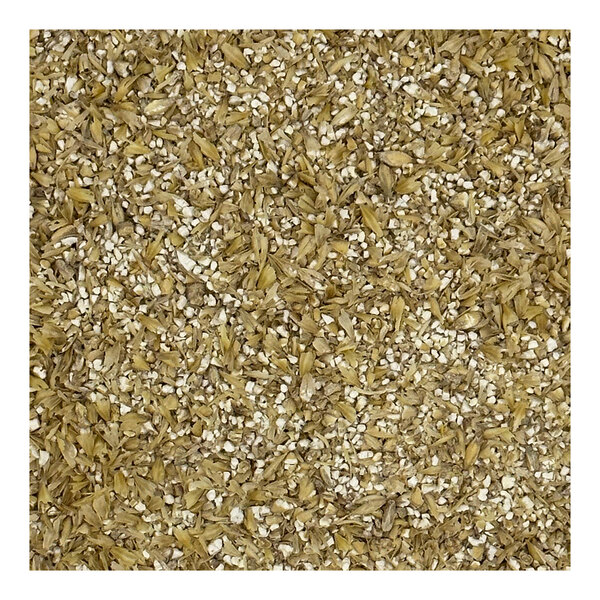A close-up of a pile of crushed white wheat malt.