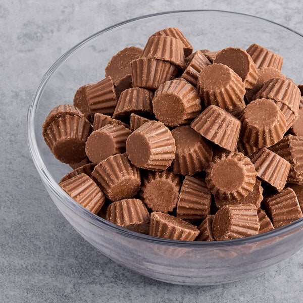 A bowl filled with REESE'S Mini Peanut Butter Cups.