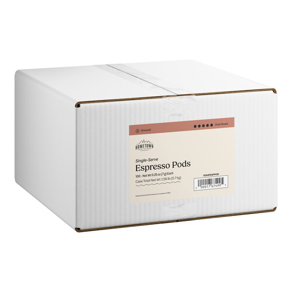 A white box labeled as containing 100 single-serve decaf espresso pods.