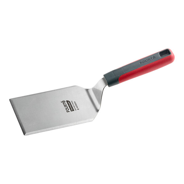 A stainless steel high heat solid beveled square edge turner with a red and black nylon handle.