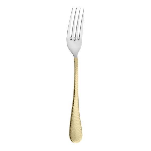 An Amefa Sierra stainless steel table fork with a gold handle.