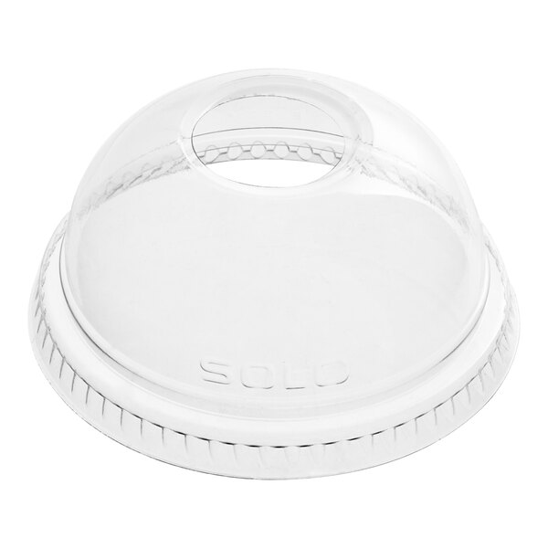A Dart clear plastic dome lid with a hole in it.