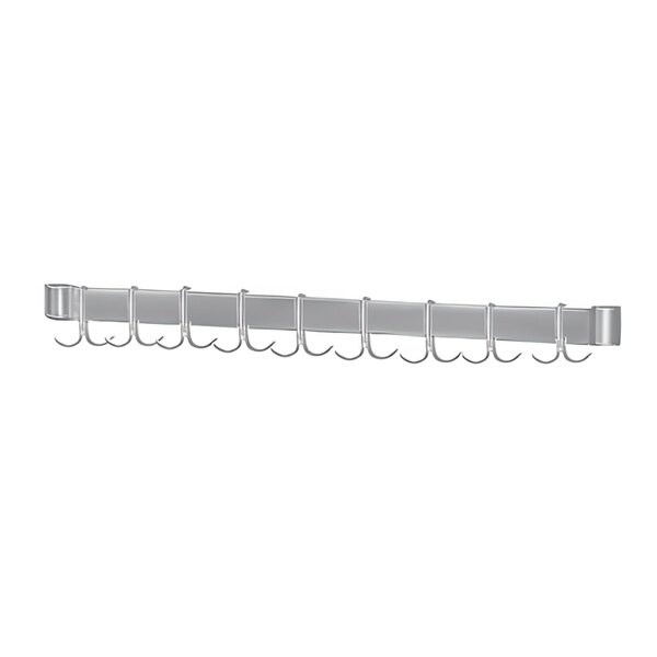 An Advance Tabco stainless steel utensil rack with metal hooks.