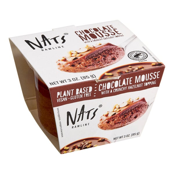 A container of Nats Rawline plant-based vegan chocolate mousse on a counter.