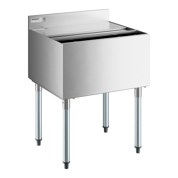 A Regency stainless steel underbar ice bin with sliding lid and bottle holders.
