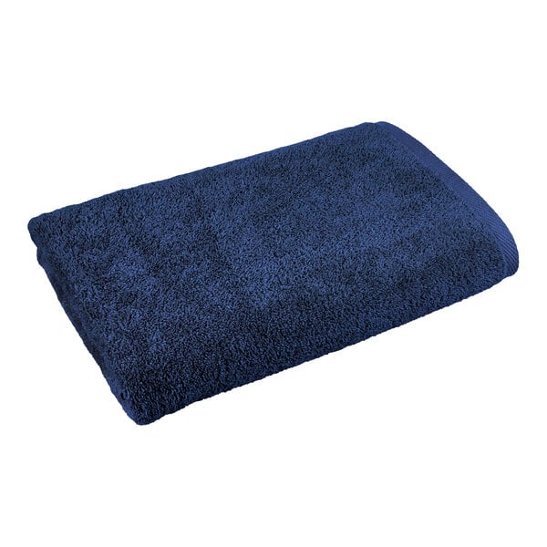 A navy blue 1888 Mills bath towel on a white background.