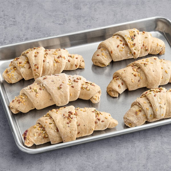 A tray of Le Chic Patissier ready-to-bake vegan blueberry-filled spelt flour croissants.