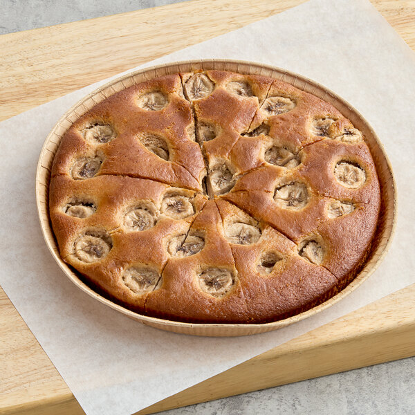 Le Chic Patissier Plant-Based Vegan Whole Wheat Banana Bread Cake on a cutting board.