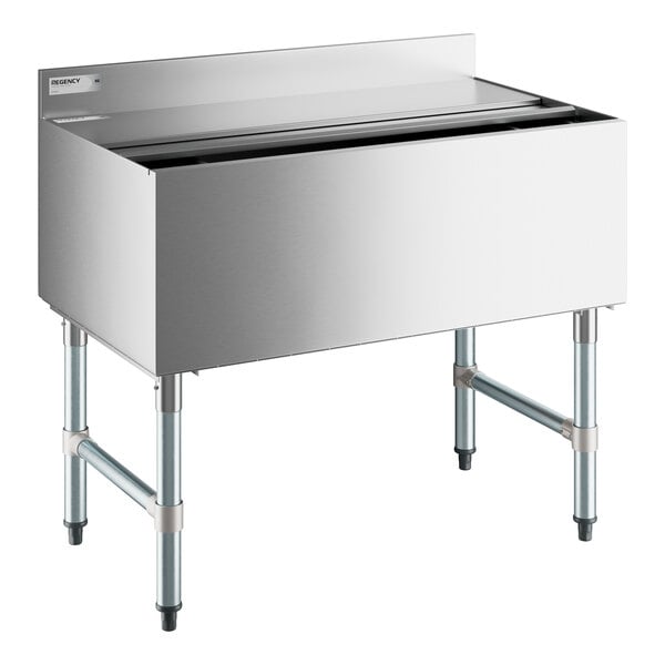 A stainless steel Regency underbar ice bin with sliding lid.
