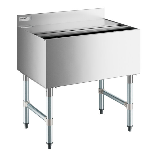 A stainless steel Regency underbar ice bin with sliding lid.