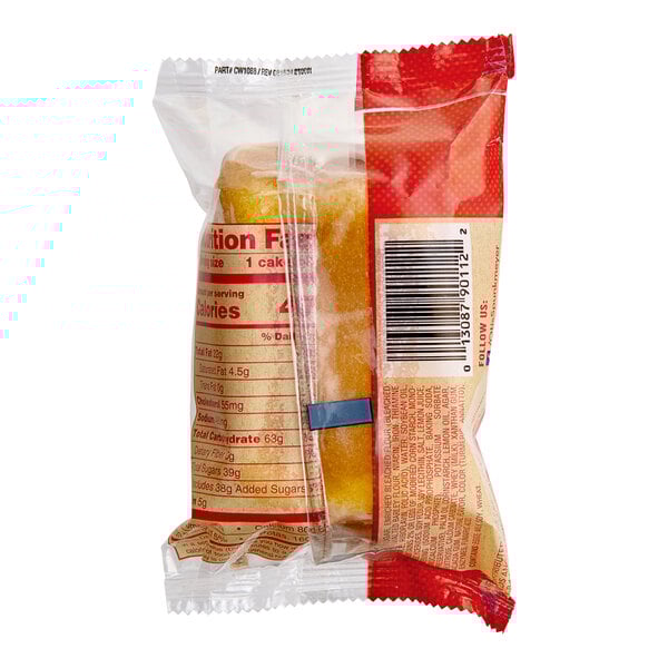 A package of Otis Spunkmeyer lemon loaf cakes with a label.