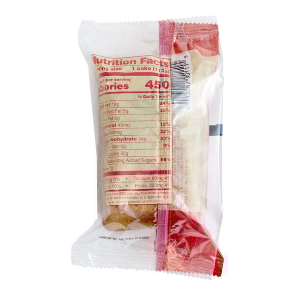 An individually wrapped Otis Spunkmeyer cinnamon crumb loaf cake in a clear plastic package.