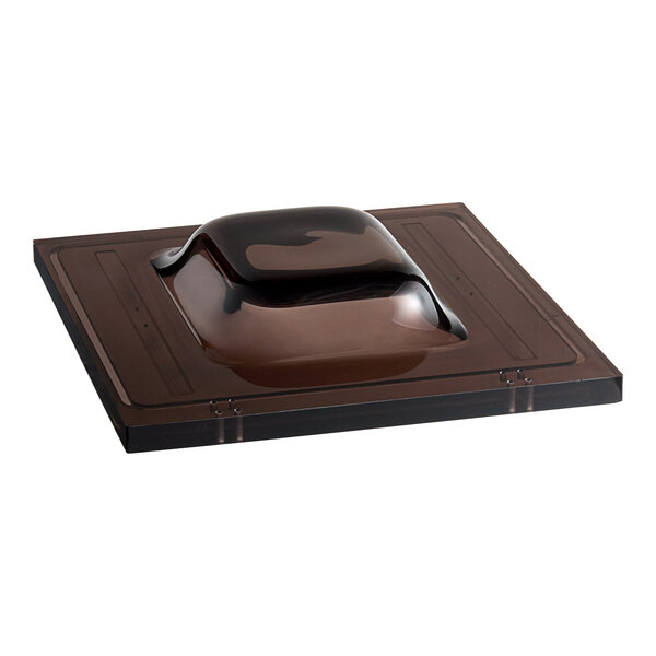 A brown square VacPak-It glass lid on a brown tray.