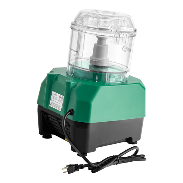 A green and black electric food processor with a clear plastic batch bowl and attached power cord.