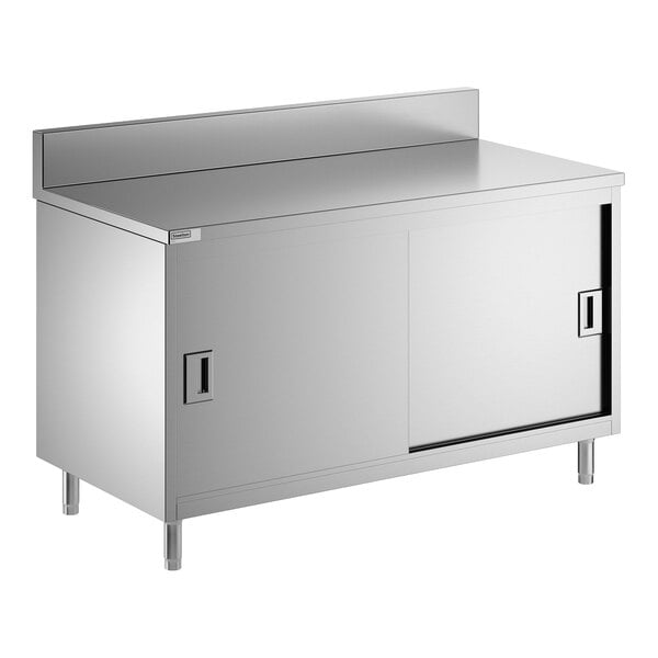 A stainless steel enclosed base table with sliding doors, a midshelf, and a 6-inch backsplash.