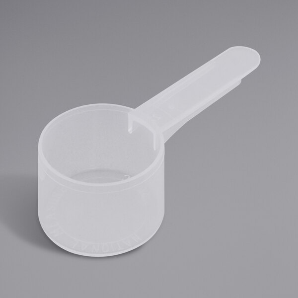 A white plastic scoop with a medium handle.