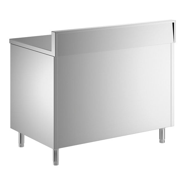 A stainless steel enclosed base table with sliding doors, a midshelf, and a 6-inch backsplash.